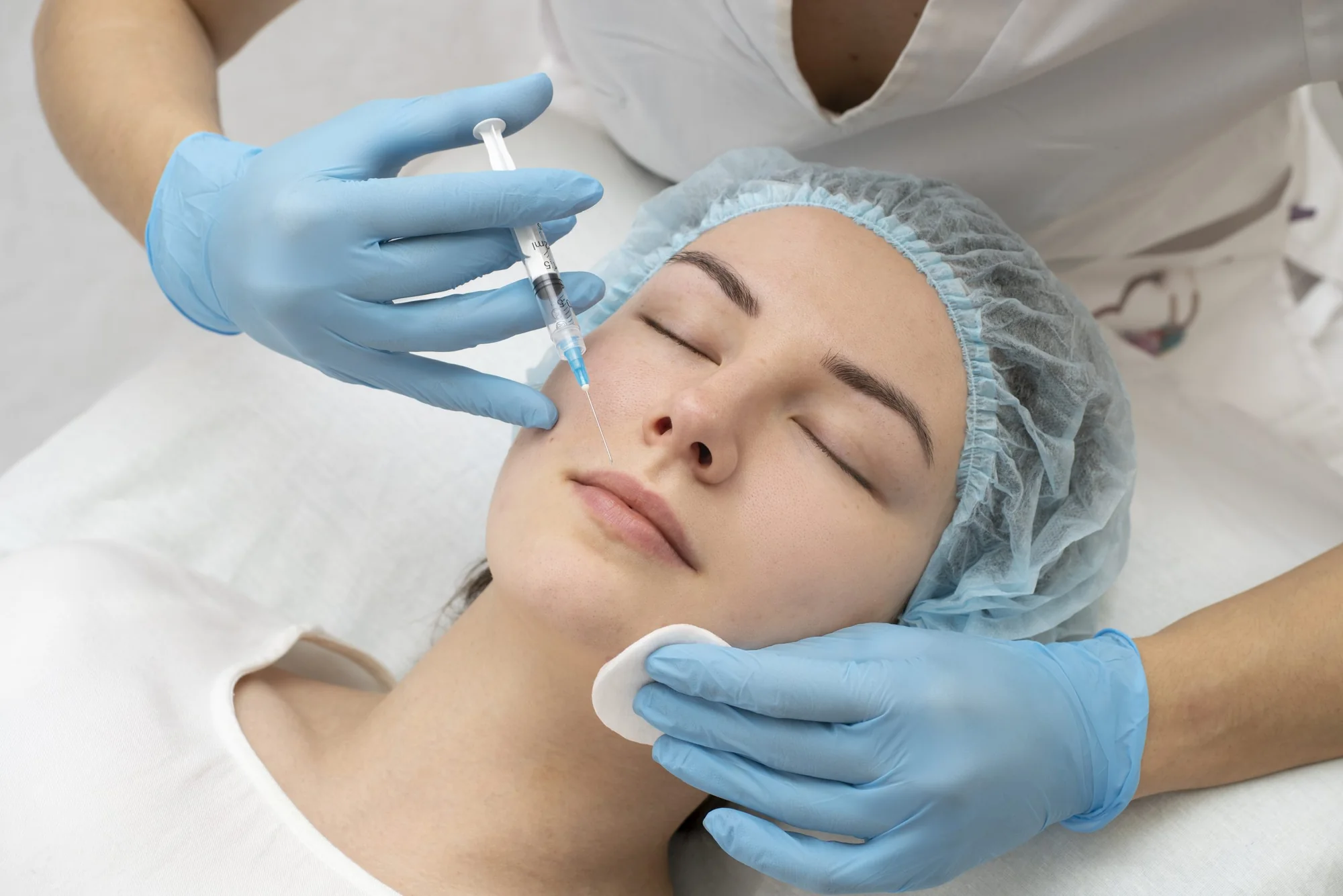 Close-up of a lip filler procedure in progress