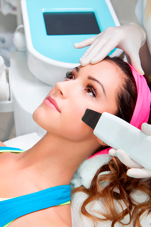 An ultrasonic skin scrubber used to exfoliate and cleanse the face